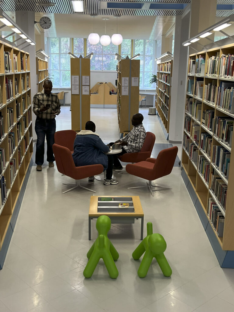 In the library, there was a moment to relax and explore the extensive selection of books.